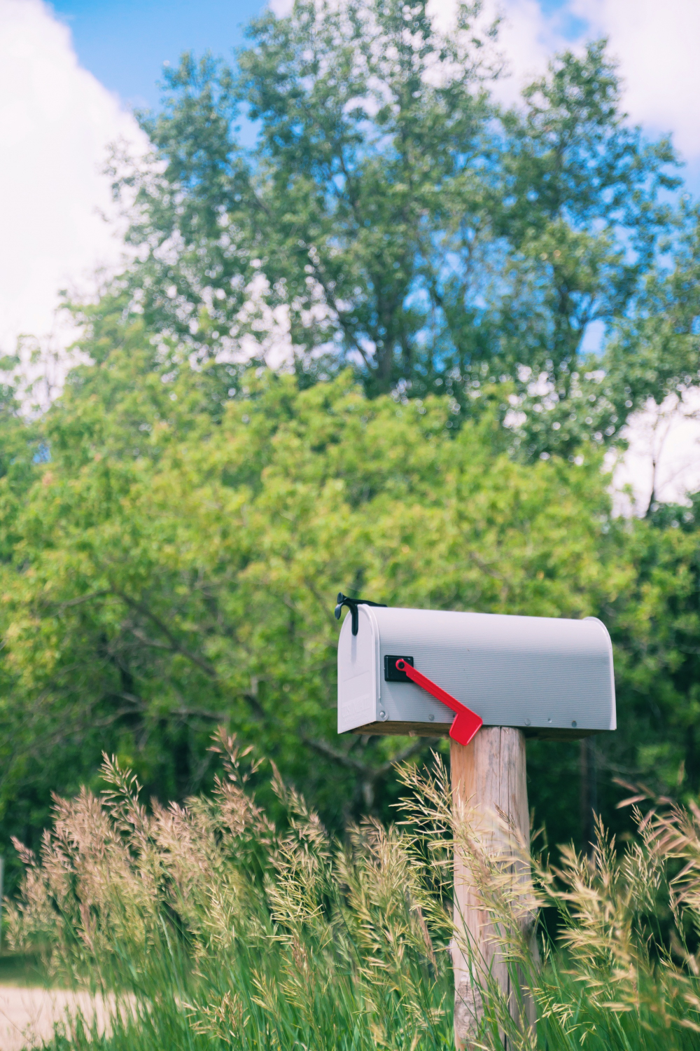 container-flag-gravel-postal-mailbox